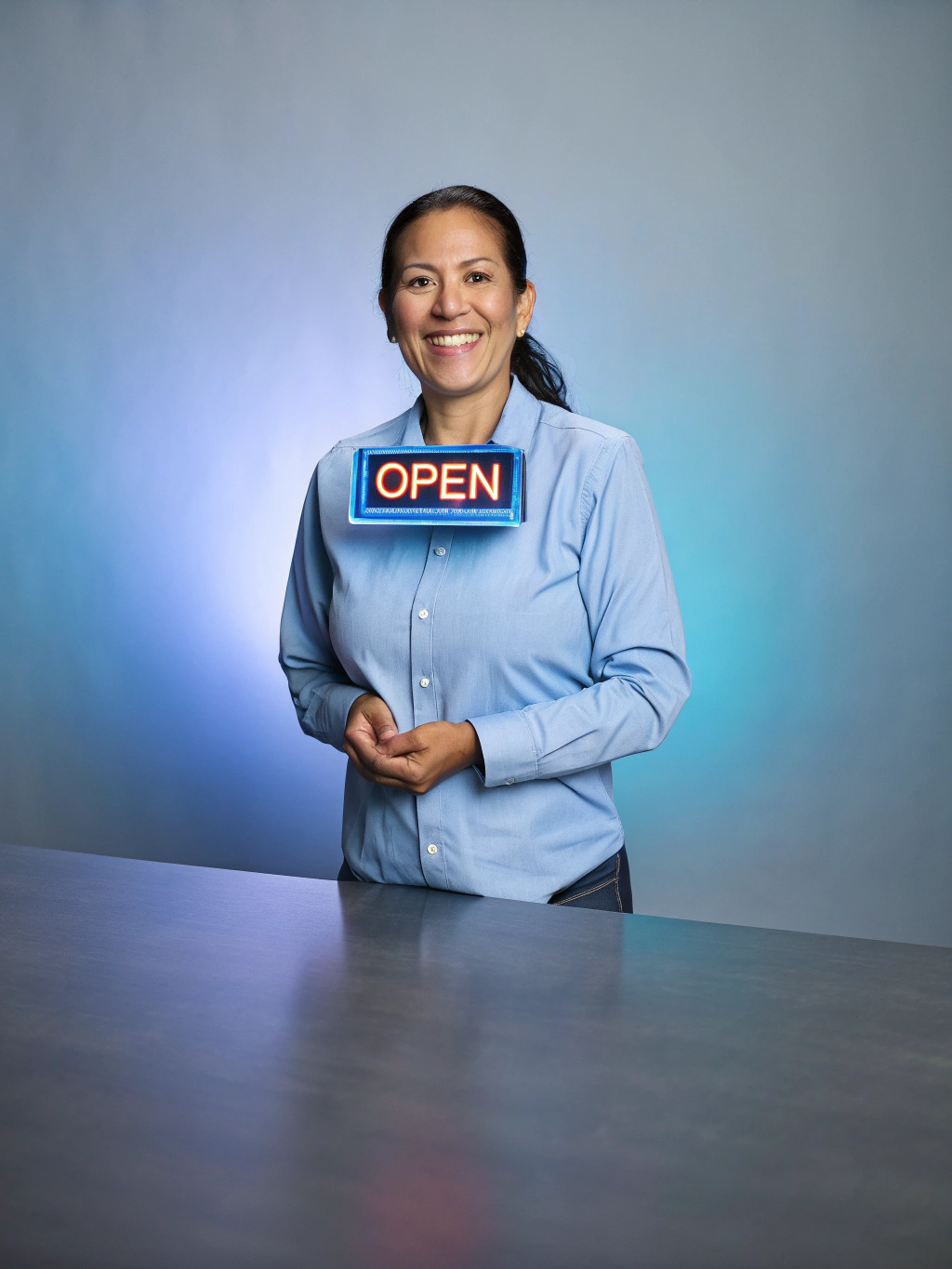 Smiling local boutique shop owner at her physical storefront entrance